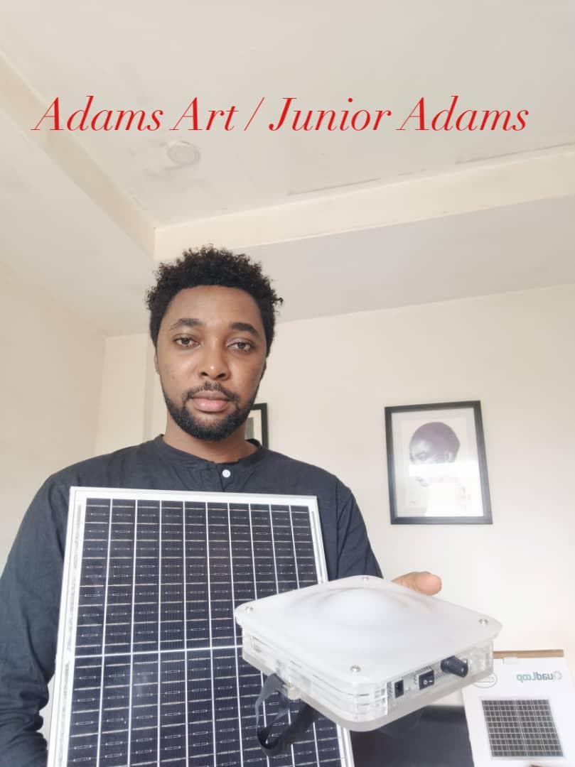 Artist Junior Adams with a Quadloop solar kit.
